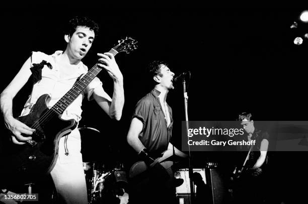 Members of British Punk group the Clash perform onstage at the Capitol Theatre, Passaic, New Jersey, March 8, 1980. Pictured are, from left, Mick...