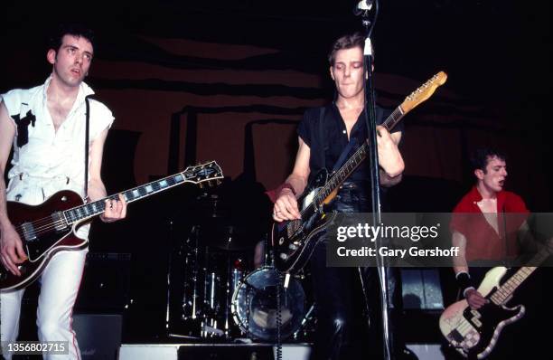 Members of British Punk group the Clash perform onstage at the Capitol Theatre, Passaic, New Jersey, March 8, 1980. Pictured are, from left, Mick...