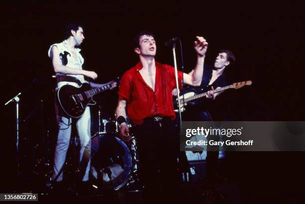 British Punk musician Joe Strummer , of the group the Clash, performs onstage at the Capitol Theatre, Passaic, New Jersey, March 8, 1980. Visible...