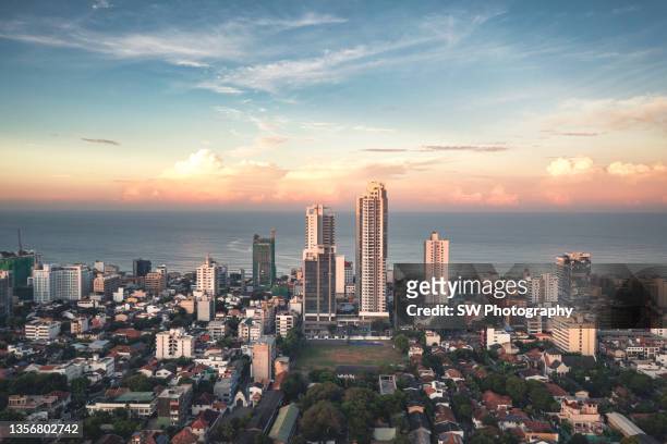 drone view of colombo city and the beach, sri lanka - srilanka city road stock-fotos und bilder