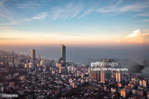 drone view of colombo city and the beach, sri lanka - srilanka city road stock-fotos und bilder