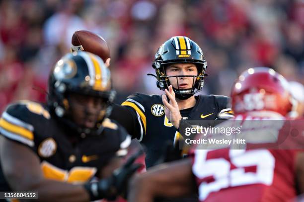 Connor Bazelak of the Missouri Tigers throws a pass during a game against the Arkansas Razorbacks at Donald W. Reynolds Razorback Stadium on November...