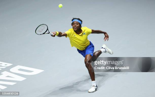 Elias Ymer of Sweden plays a forehand against Andrey Rublev of Russian Tennis Federation during the Davis Cup Quarter Final between Russian Tennis...