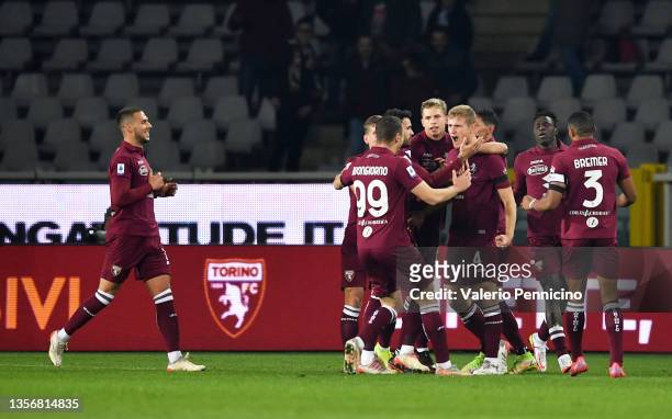 Tomaso Pobega of Torino FC celebrates scoring his sides first goal with team mates during the Serie A match between Torino FC and Empoli FC at Stadio...