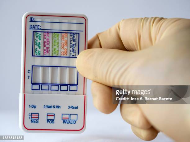 multi-drug screening kit for testing urine on a white background. - drug testing lab stock pictures, royalty-free photos & images