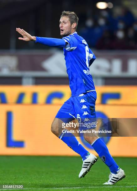 Simone Romagnoli of Empoli celebrates scoring his sides first goal during the Serie A match between Torino FC and Empoli FC at Stadio Olimpico di...
