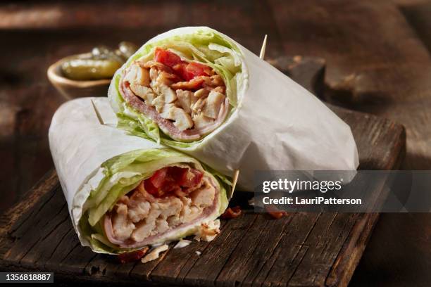 roast chicken blt lettuce wrap sandwich - wrap sandwich stock pictures, royalty-free photos & images