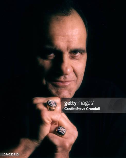 New York Yankees manager, Joe Torre, pose for a photo with his rings of ortrait while wearing his World Series rings of 1996 and 1999 on February 06,...