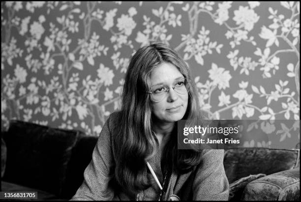 View of American feminist leader and author Gloria Steinem in a room at a Holiday Inn, San Francisco, California, November 1977.