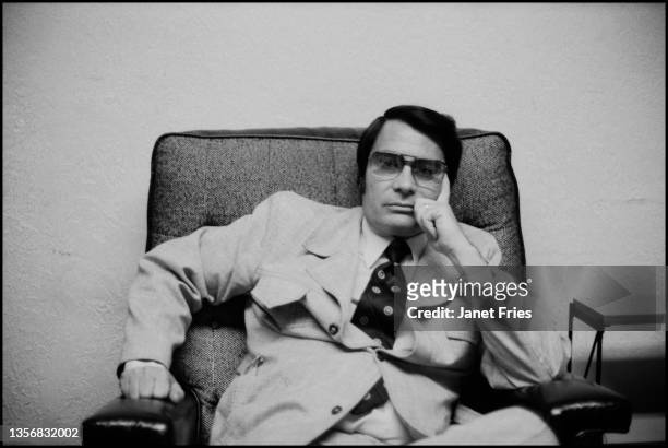 Portrait of American cult leader and founder of the People's Temple Jim Jones as he poses in his office, San Francisco, California, July 3, 1976.