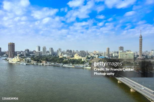 cairo skyline with nile river, 6 of october bridge and cairo tower on gezira island in cairo, egypt - cairo bildbanksfoton och bilder