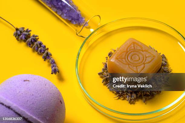 trendy  beauty products with  lavender plant ekstrakt. - bath bomb stock pictures, royalty-free photos & images