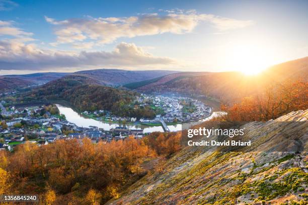 autumnal sunset over monthermé from la roche à 7 heures. - ardennes stock pictures, royalty-free photos & images