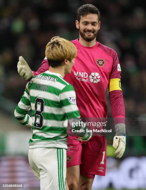 Hearts goalkeeper Craig Gordon interacts with Kyogo Furuhashi of Celtic during the Cinch Scottish Premiership match between Celtic FC and Heart of...