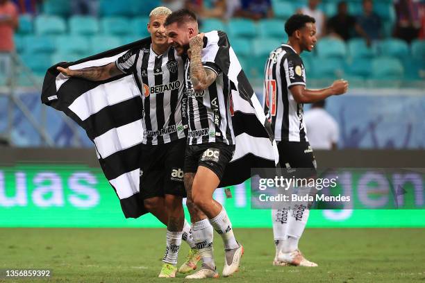 Guilherme Arana of Atletico Mineiro Nathan and Neto of Atletico Mineiro celebrate the victory and the championship after a match between Bahia and...