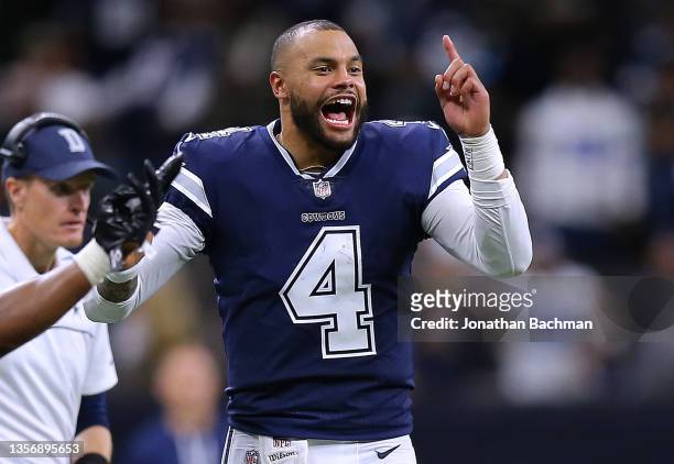 Dak Prescott of the Dallas Cowboys celebrates during the second half against the New Orleans Saints at the Caesars Superdome on December 02, 2021 in...