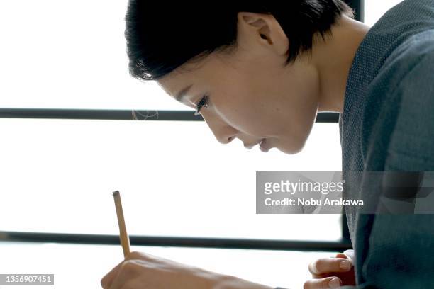 calligraphy scene - writing - national diet of japan stock pictures, royalty-free photos & images