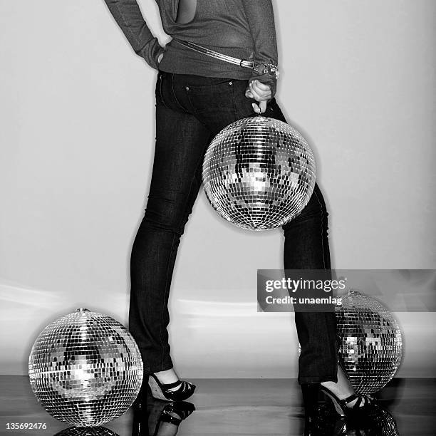 half female body with three disco balls (globes) - silver disco ball stock pictures, royalty-free photos & images