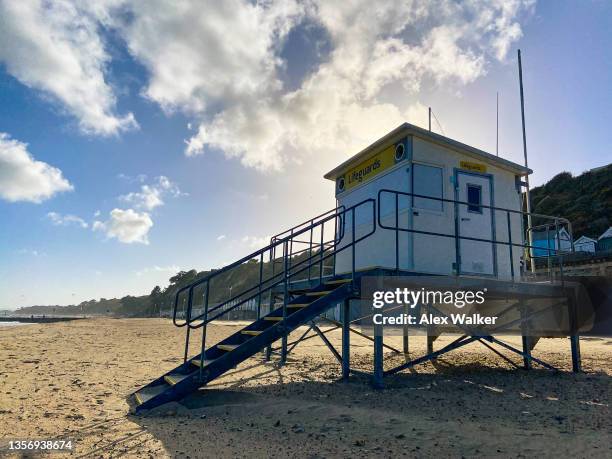 lifeguards beach hut on empty beach in summer. - sandbanks bildbanksfoton och bilder