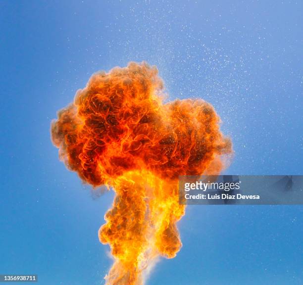 flames and fire from gasoline explosion - fireball stock-fotos und bilder