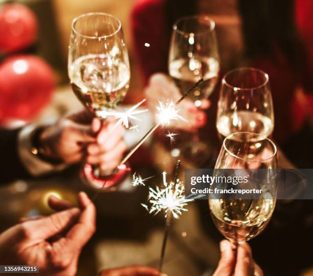 new year celebration with champagne - victory dinner stockfoto's en -beelden