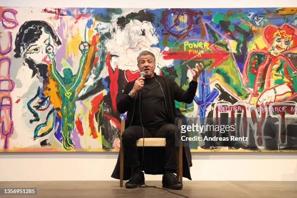 Sylvester Stallone attends a press conference during the opening of the exhibition "Sylvester Stallone - Retrospektive zum 75. Geburtstag" at Osthaus...