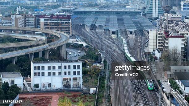 The first train of the China-Laos Railway, a 1,035-km electrified passenger and cargo railway connecting Kunming in southwest China's Yunnan Province...