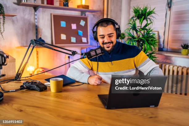 man doing online podcast - male journalist stock pictures, royalty-free photos & images