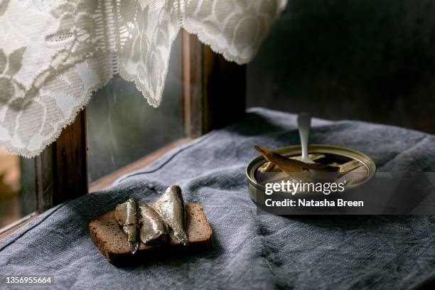 open can with canned sprats in oil - baltic sea fish stock pictures, royalty-free photos & images