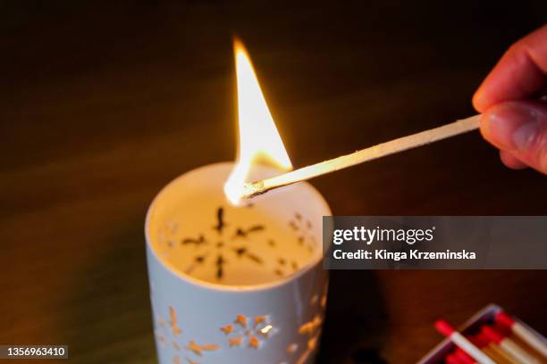 lighting candle - igniting stock pictures, royalty-free photos & images