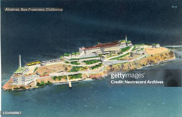 Vintage colorized historic souvenir photo postcard published circa 1947 depicting an aerial view of the infamous prison, Alcatraz, in San Francisco...