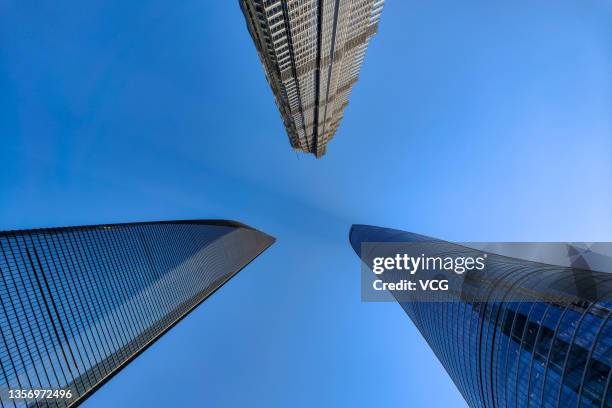 The Jinmao Tower, the Shanghai Tower and the Shanghai World Financial Center stand at Lujiazui Financial Centre on December 2, 2021 in Shanghai,...