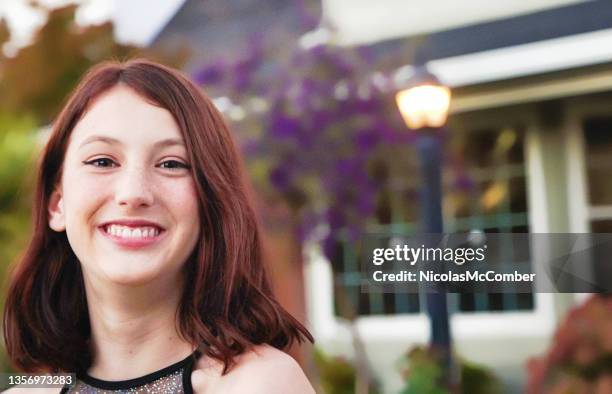 smiling close-up portrait of female teenager in suburban setting - freckle girl stock pictures, royalty-free photos & images