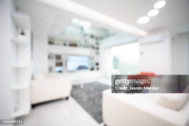 living room out of focus as real estate template background - blurry living room stockfoto's en -beelden