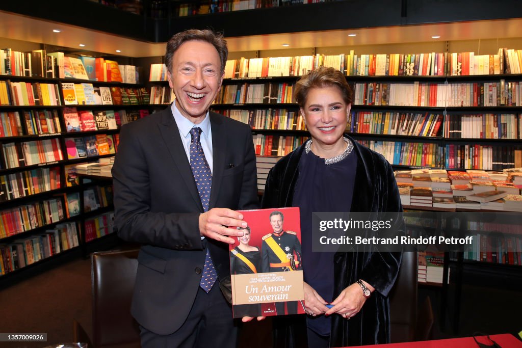 Grand Duchess Maria Teresa Of Luxembourg And Stéphane Bern Sign Their Book "Un Amour Souverain - Sovereign Love" In Paris