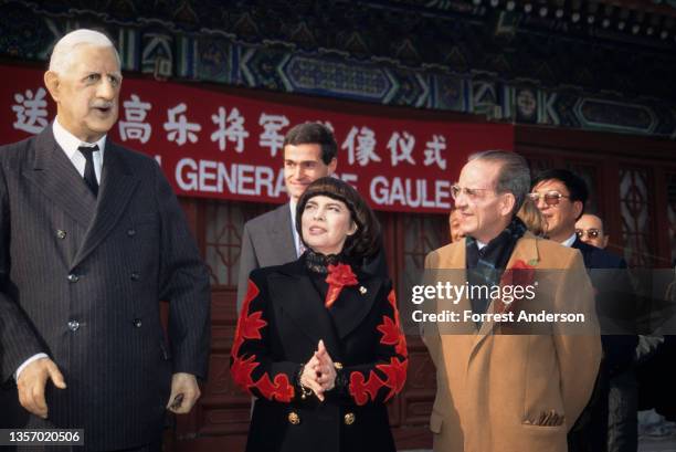 View of French singer Mirielle Mathieu as, with unidentified others, she attends the unveiling of a wax figure in Ditan Park, Beijing, China,...