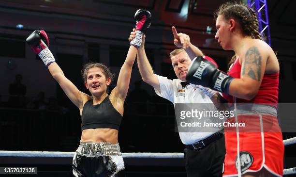 Nina Hughes celebrates victory after the Bantamweight fight between Nina Hughes and Claudia Ferenczi as part of the MTK fight night at York Hall on...