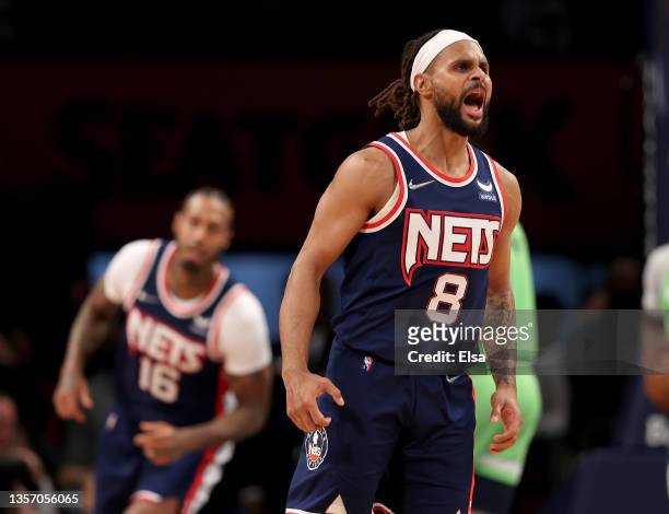 Patty Mills of the Brooklyn Nets celebrates his shot late in the fourth quarter against the Minnesota Timberwolves at Barclays Center on December 03,...