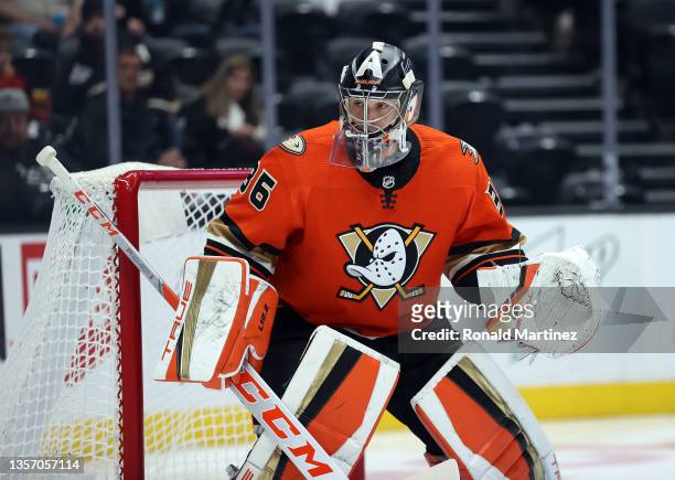 John Gibson of the Anaheim Ducks in goal against the Calgary Flames in the first period at Honda Center on December 03, 2021 in Anaheim, California.