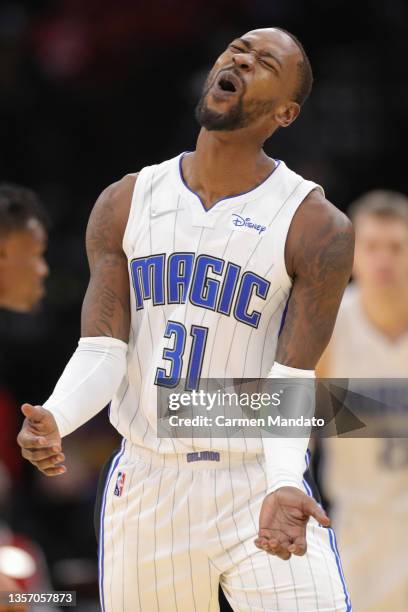 Terrence Ross of the Orlando Magic reacts to a play during the second half against the Houston Rockets at Toyota Center on December 03, 2021 in...