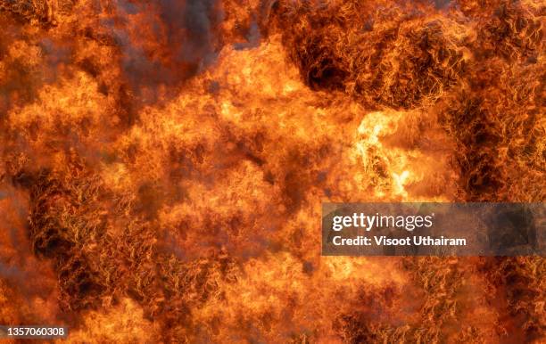 blaze fire flame texture background,abstract flames,sparkles,flame and light. - dynamite - fotografias e filmes do acervo