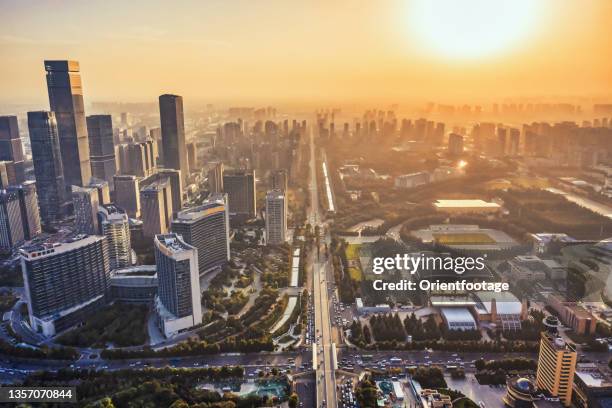 aerial view of city at sunset,xi'an,china. - xian stockfoto's en -beelden