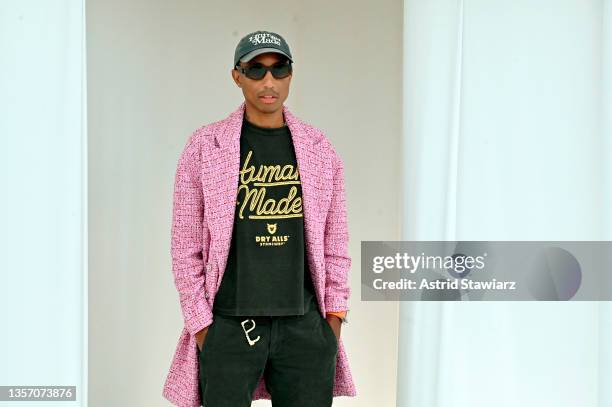 Pharrell Williams, wearing CHANEL, attends the CHANEL Dinner to celebrate FIVE ECHOES By Es Devlin at Jungle Plaza in the Miami Design District on...