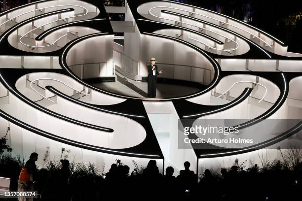 Artist and designer Es Devlin speaks from inside her FIVE ECHOES installation during the CHANEL Dinner to celebrate FIVE ECHOES By Es Devlin at...