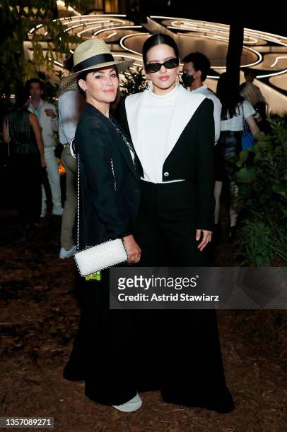 Es Devlin and Rosalía, wearing CHANEL, attend the CHANEL Dinner to celebrate FIVE ECHOES By Es Devlin at Jungle Plaza in the Miami Design District on...