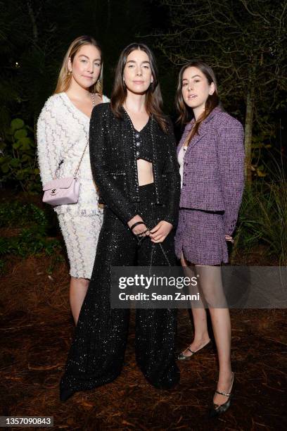 Este Haim, Danielle Haim and Alana Haim, all wearing CHANEL, attend the Chanel Dinner To Celebrate Five Echoes By Es Devlin, Jungle Plaza, Miami...