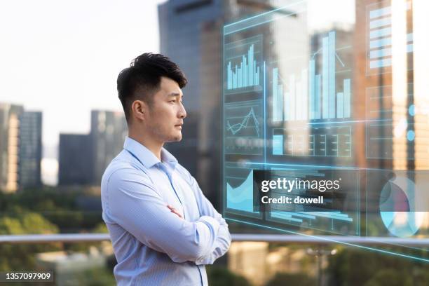 young man with smart vr screen in city street - hologram city stock pictures, royalty-free photos & images