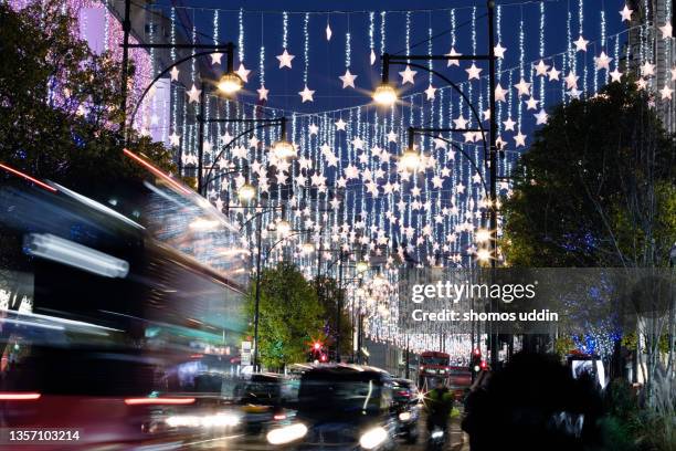 london oxford street at dusk during christmas season - oxford street stock-fotos und bilder