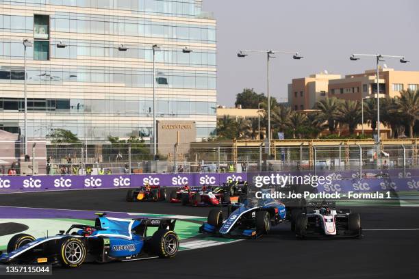 Guanyu Zhou of China and UNI-Virtuosi Racing and Christian Lundgaard of Denmark and ART Grand Prix collide during sprint race 1 of Round 7:Jeddah of...