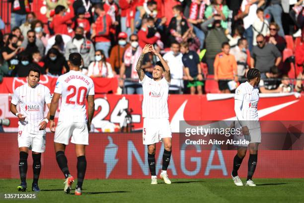 Lucas Ocampos of Sevilla celebrates after scoring their team's first goal during the La Liga Santander match between Sevilla FC and Villarreal CF at...